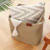 CESTO DE TELA CON MANIJA DE CUERO